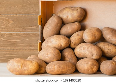 Idaho Potatoes In Box Close Up On Wooden Background