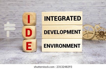 IDE - Integrated Development Environment - software application that provides comprehensive facilities to computer programmers for software development, acronym concept on notepad