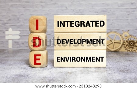 IDE - Integrated Development Environment - software application that provides comprehensive facilities to computer programmers for software development, acronym concept on notepad