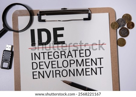 IDE - Integrated Development Environment - software application that provides comprehensive facilities to computer programmers for software development, acronym concept on notepad