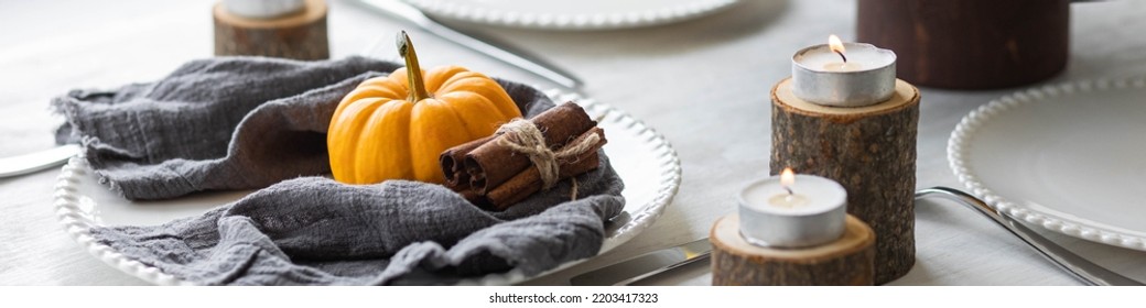 Idea For A Beautiful Autumn Setting For Thanksgiving Family Dinner Or Wedding. Orange Pumpkin As Decor. Cozy Fall Home Atmosphere. Banner Copy Space For Text