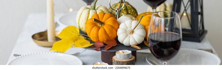 Idea For A Beautiful Autumn Setting For Thanksgiving Family Dinner Or Wedding. Orange Pumpkin As Decor. Cozy Fall Home Atmosphere. Banner Copy Space For Text