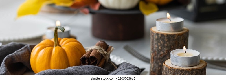 Idea For A Beautiful Autumn Setting For Thanksgiving Family Dinner Or Wedding. Orange Pumpkin As Decor. Cozy Fall Home Atmosphere. Banner Copy Space For Text