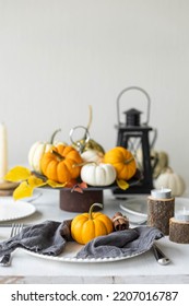 Idea For A Beautiful Autumn Setting For Thanksgiving Family Dinner Or Wedding. Orange Pumpkin As Decor. Cozy Fall Home Atmosphere.