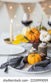 Idea For A Beautiful Autumn Setting For Thanksgiving Family Dinner Or Wedding. Orange Pumpkin As Decor. Cozy Fall Home Atmosphere.