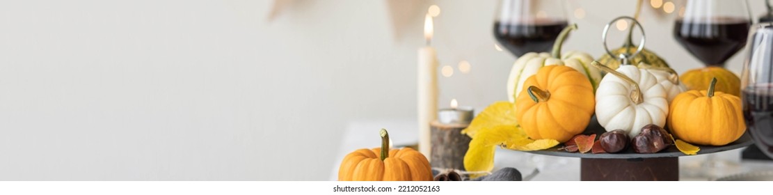 Idea For A Beautiful Autumn Setting For Thanksgiving Family Dinner Or Wedding. Orange Pumpkin As Decor. Cozy Fall Home Atmosphere. Banner Copy Space For Text