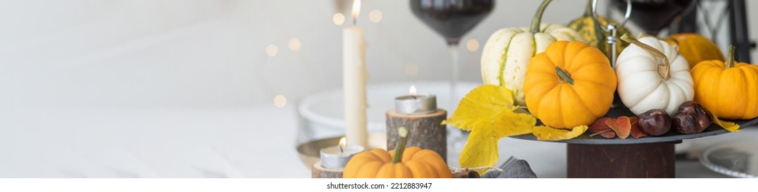 Idea For A Beautiful Autumn Setting For Thanksgiving Family Dinner Or Wedding. Orange Pumpkin As Decor. Cozy Fall Home Atmosphere. Banner Copy Space For Text