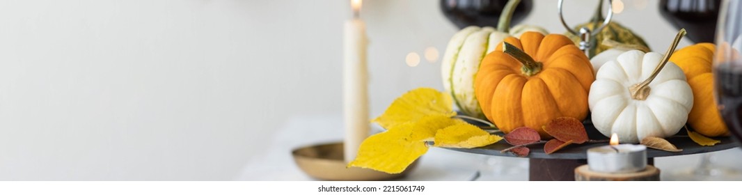 Idea For A Beautiful Autumn Setting For Thanksgiving Family Dinner Or Wedding. Orange Pumpkin As Decor. Cozy Fall Home Atmosphere. Banner Copy Space For Text