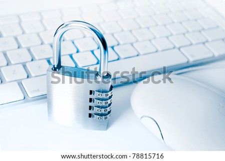 idea for computer and online security with keyboard and padlock