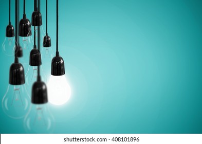 Idea Concept With Light Bulb On The Background Blue Color.