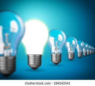 Idea concept with light bulbs on blue - Shutterstock ID 184543541