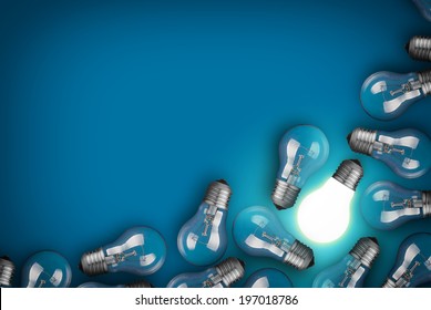 Idea Concept With Light Bulbs On Blue Background