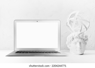 Idea Concept With Thinking Head Of White Antique Statue David And Abstract Image Of His Thoughts As Swirl Paths Of Electron Spin, Blank Laptop Screen For Text. Brainstorming Background For Business.