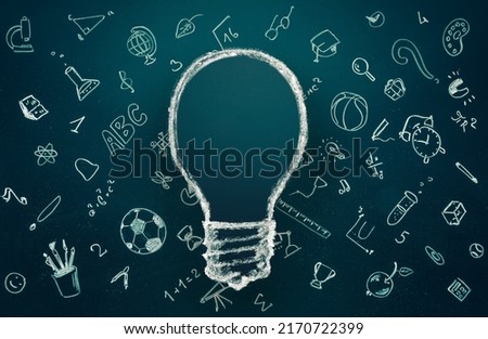 idea and eduction concept. Light bulb with hand drawn school doodle icons. Studying, knowledge, learning idea.