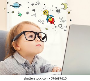 Idea Rocket concept with toddler girl using her laptop