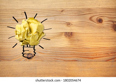 Idea solution concept, a light bulb with crumpled paper