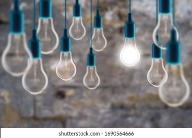 Idea And Teamwork Concept Vintage Incandescent Bulbs On The Grunge Background