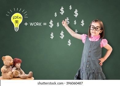 Idea and work can make lots of money equation show by cute little girl on green chalk board.