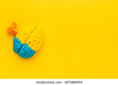Ideas concept. Work of brain - model made of colorful clay, top view