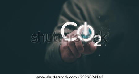 Ideas for reducing carbon emissions or using carbon credits for organizations. Businessman showing carbon credit and green business environmental conservation sustainable environmental development