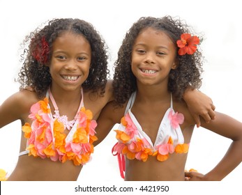 Identical Twin Sisters Dressed Up As Hula Girls