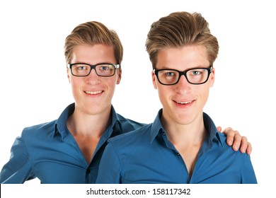 Identically Adult Male Twins In Studio