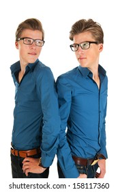 Identically Adult Male Twins In Studio