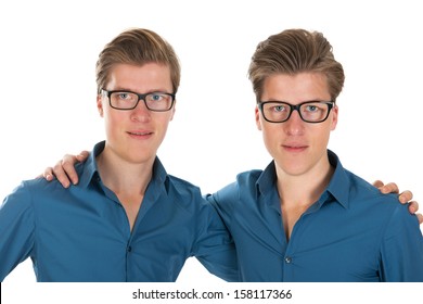 Identically Adult Male Twins In Studio