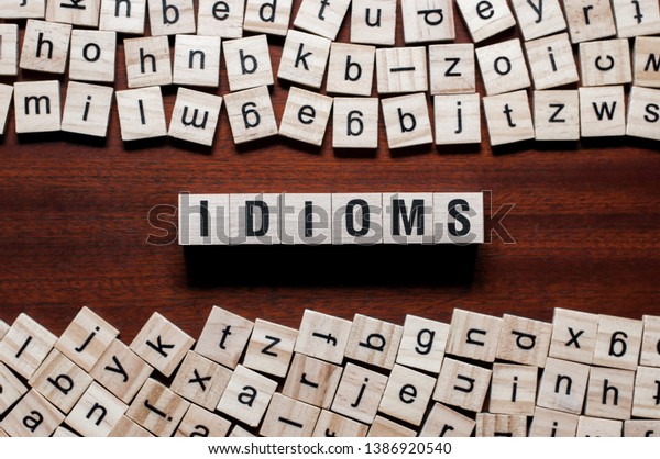 Idioms word concept on cubes