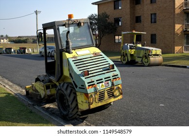 Idle Road Work Machines In Australia, Coffs Harbour On 5 August 2018. Road Building Machinery Tandem Smooth Drum Roller And Padfoot Single Drum Roller At Construction Site