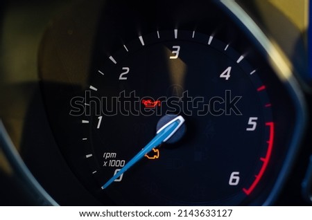Idle tachometer. Car Instruments Dash Panel Closeup. RPM and Speed Metering. Transportation Photo Stock
