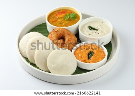 idli vada with sambar ,sambhar also called medu wada South Indian Breakfast menu, Idly Vadai with coconut chutney and sambar