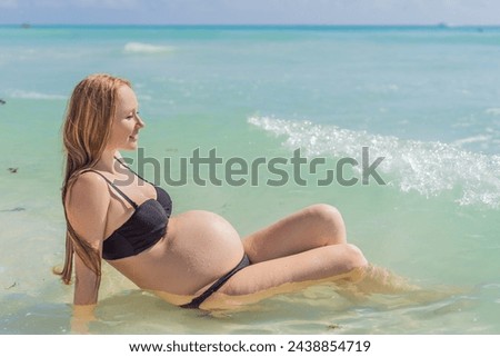 In the idyllic embrace of the Caribbean Sea, a pregnant woman finds bliss, savoring the warmth and serenity of the tropical waters during her pregnancy