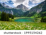 idyllic Lake Lauenensee with Wildhorn in spring, Bernese Alps, Switzerland