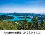 Idyllic landscape on the lake of Plastiras in central Greece. Lake Plastiras is an artificial lake fed by Tavropos river, located in Karditsa regional unit, near the city of Karditsa, Greece.