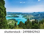 Idyllic landscape on the lake of Plastiras in central Greece. Lake Plastiras is an artificial lake fed by Tavropos river, located in Karditsa regional unit, near the city of Karditsa, Greece.