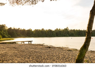 Idyllic Swimming Lake With A Sandy Beach In Lower Saxony