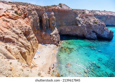 Idyllic Tsigrado Beach Surrounded By Beautiful Cliffs On Greek Island Of Milos