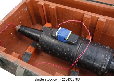 IED (improvised explosive device) with 125mm USSR Tank HEAT Projectile in wooden ammunition crate
