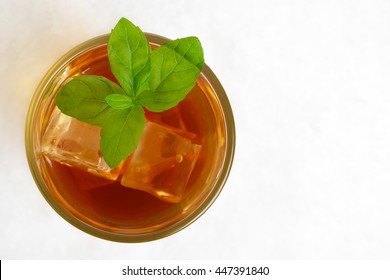 Iew From Above On Ice Tea,ice Cubes,mint On Ice On White Background