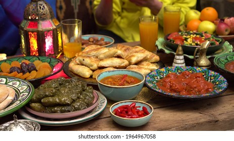 Iftar During Ramadan. Muslims Break The Fast With Dates. When The Sun Goes Down, Family And Friends Typically Gather Around A Table Of Lavish Feasts