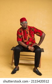 Igbo Traditionally Dressed Business Man Sitting Down