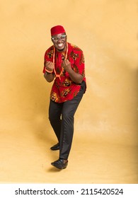 Igbo Traditionally Dressed Business Man Double Fist Pump