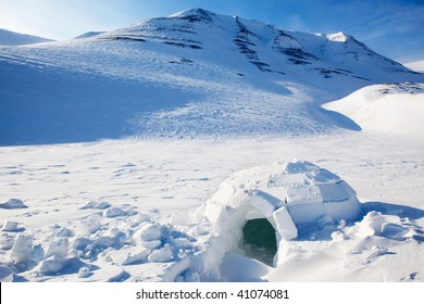 Igloo in a winter mountain setting