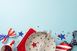 Ignite Your Patriotic Pride With Table Arrangement That Screams Independence Day! Top View Of Plate, Cup, Cutlery, Napkin, Stars, Confetti, Tie, Bow-tie On Light Blue Backdrop. Ideal For Text Or Ads