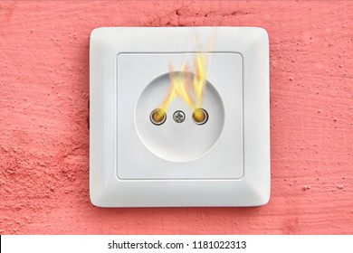 Ignition Of A Faulty Household Wall Outlet, Close-up.