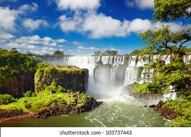 Iguassu Falls, the largest series of waterfalls of the world, located at the Brazilian and Argentinian border, View from Argentinian side - Shutterstock ID 103737443