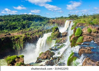 Iguazu Falls, On The Border Of Argentina, Brazil, And Paraguay.