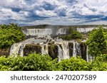 Iguazu falls waterfall in Argentina and Brazil border on the river Iguazu. Tropical landscape with powerful waterfall stream in the jungle. Iguassu falls, cataratas iguazu natural wonder national park