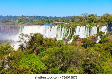 Iguazu Falls are waterfalls of the Iguazu River on the border of the Argentina and the Brazil. It's one of the New 7 Wonders of Nature on the border of Brazil and Argentina. - Shutterstock ID 736075873